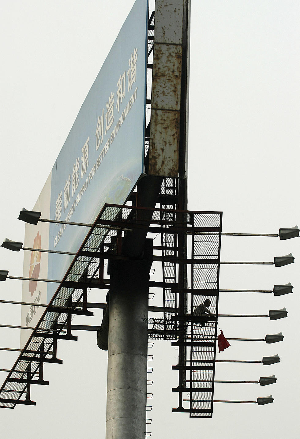 Man Stops Traffic On Prien Lake After Climbing Up A Billboard Sign