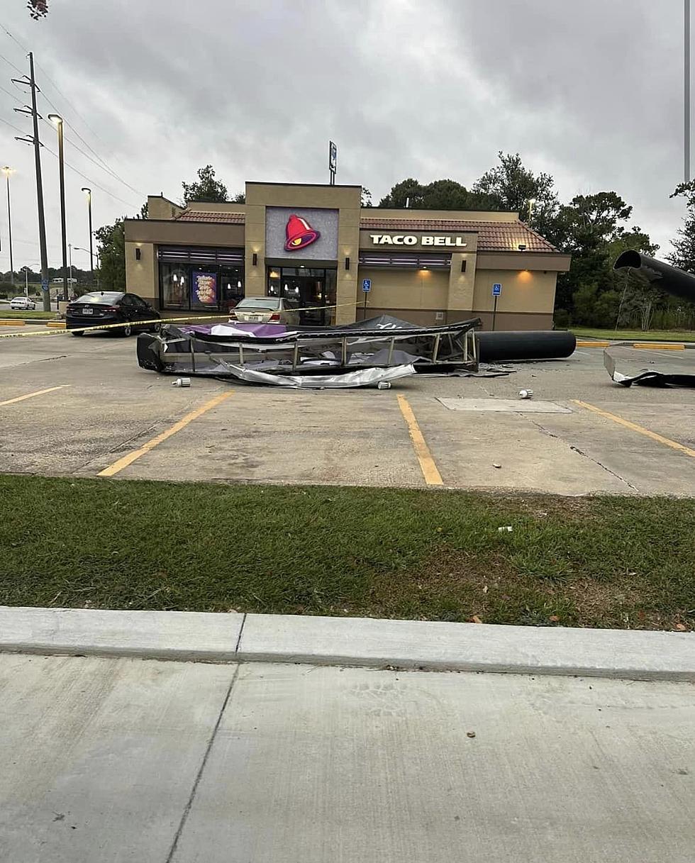 Taco Bell Sign Crushes Car in Parking Lot 