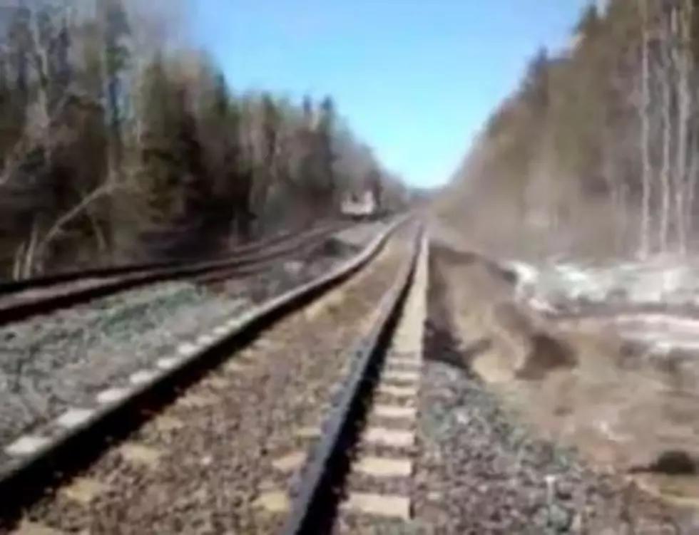 Amazing Video of Flood Water Washing Away a Train Track