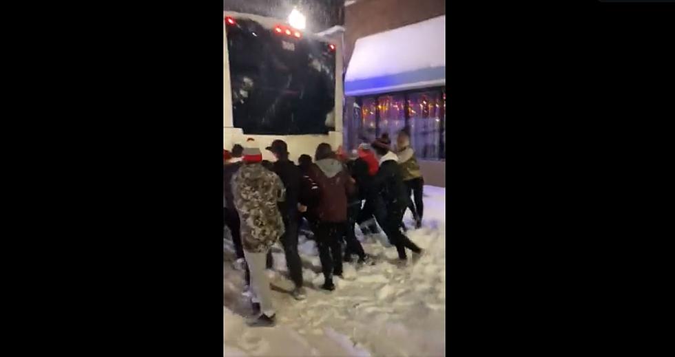 Watch The Delano Hockey Team Push Its Bus Out Of The Snow On The Iron Range [VIDEO]