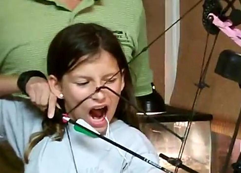 Girl Pulls Out Tooth Using a Bow & Arrow [VIDEO]
