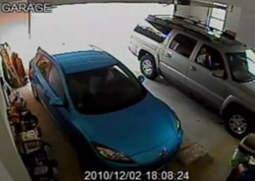 17 Year Old Girl Fails Backing Out of Garage [VIDEO]