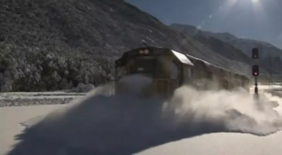 Amazing Video of Train Plowing Through Tracks Covered with Snow