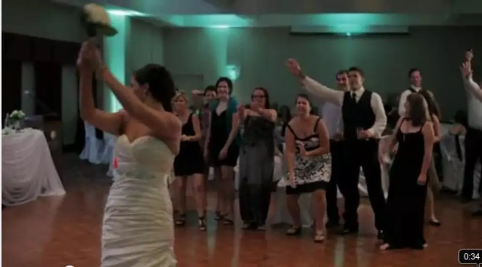 Wedding Guest Left Embarrassed After Bouquet Toss and Fail [VIDEO]
