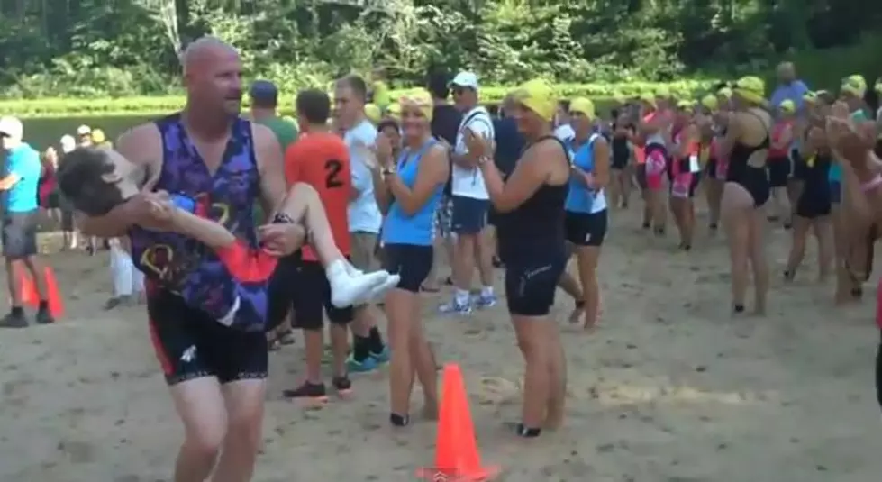 Father Participates In Triathlon While Carrying Disabled Daughter [VIDEO]
