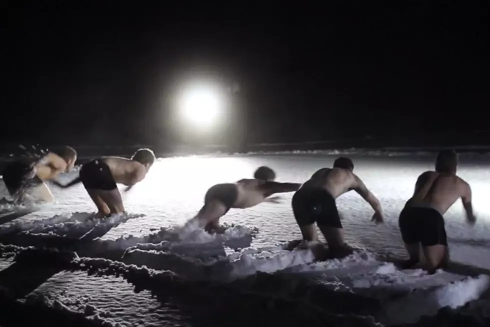 Watch the Frigidly Cold Snow Swimming World Championship
