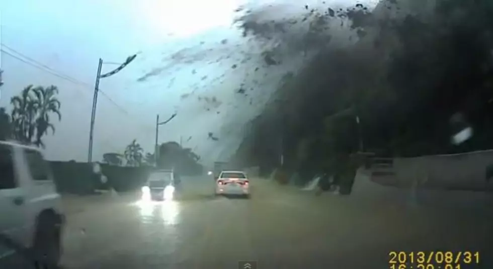 Amazing Video of One Of The Luckiest Guys Alive Narrowly Escaping Being Smashed By Giant Falling Boulder [VIDEO]