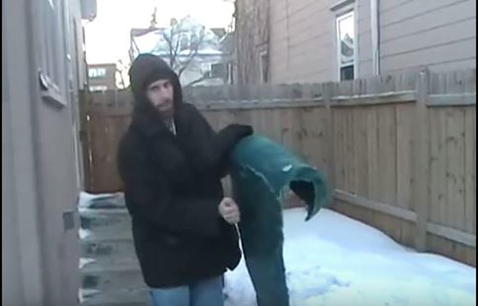 Cold Weather Fun, Making a Sled out of a Frozen Towel [VIDEO]