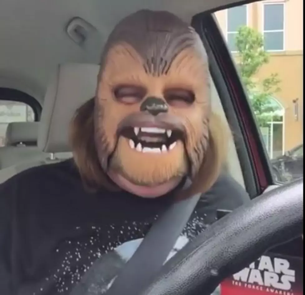 Grown Woman is Ecstatic Over her Chewbacca Mask [VIDEO]