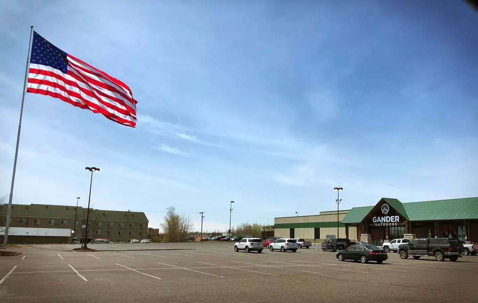 Gander Outdoors Unveils Huge Flag for Its Hermantown Location
