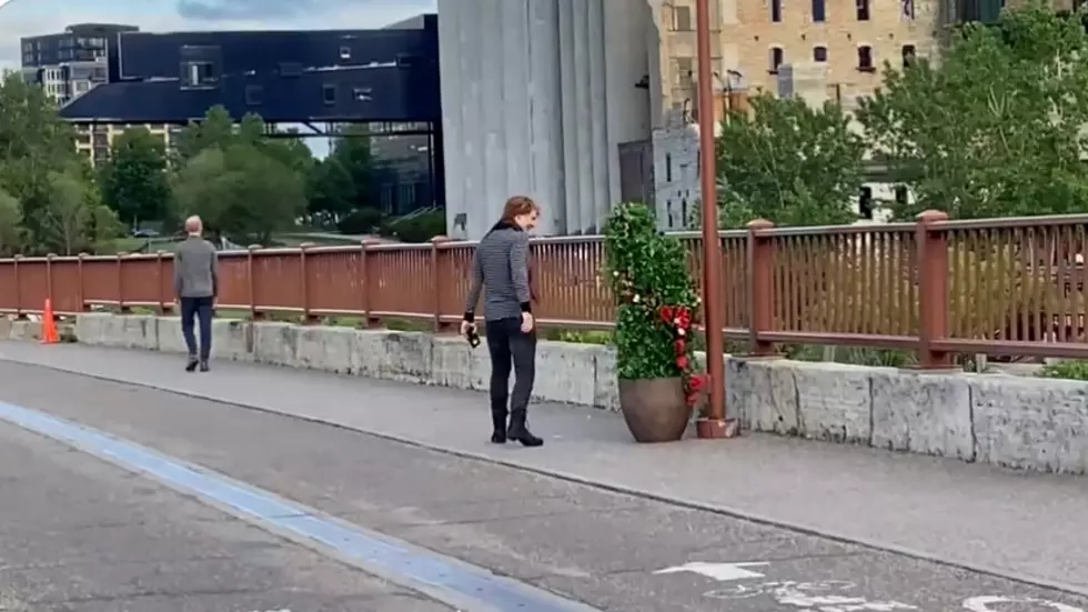 Hilarity Ensues As Person Disguised As A Bush Jumped Out At Pedestrians On A Minnesota Bridge