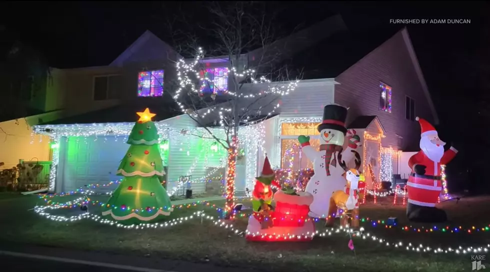 Minnesota Couple Shamed By Grinch Neighbor For Holiday Lights Display