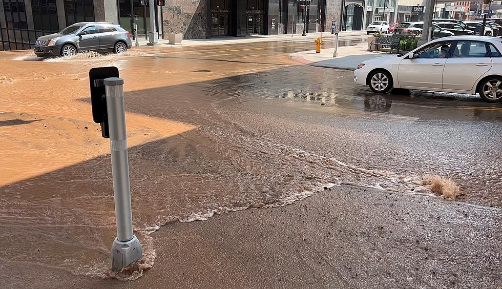WATCH: Water Pouring Down 3rd Avenue West, Flooding Superior Street In Downtown Duluth Monday