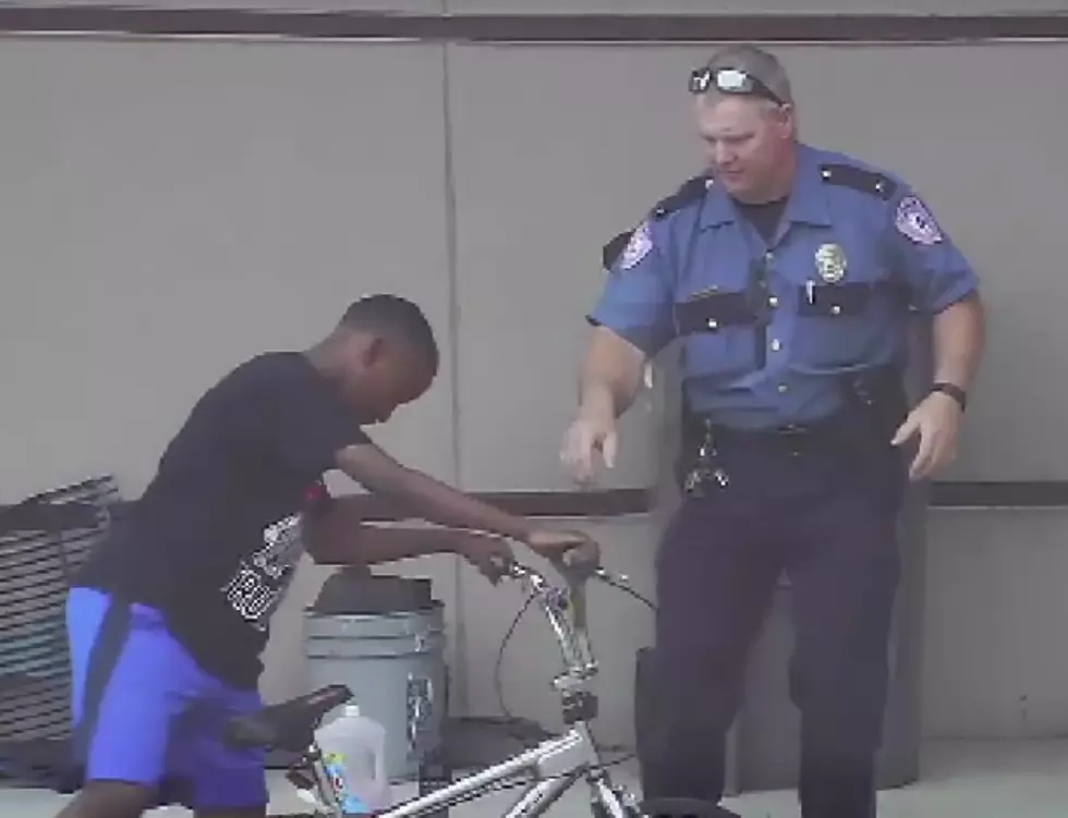 Video Of Lufkin Police Lt. Helping Fix A Boy&#8217;s Tire Is Our New Favorite Thing