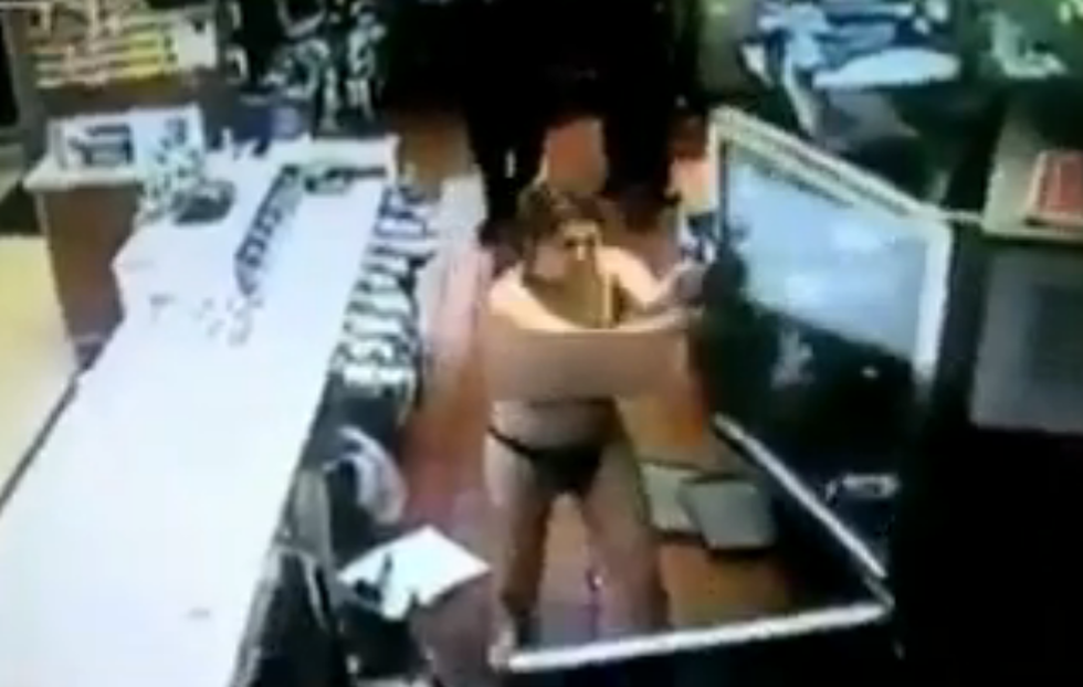 Topless Woman Trashes a McDonalds Store [VIDEO]