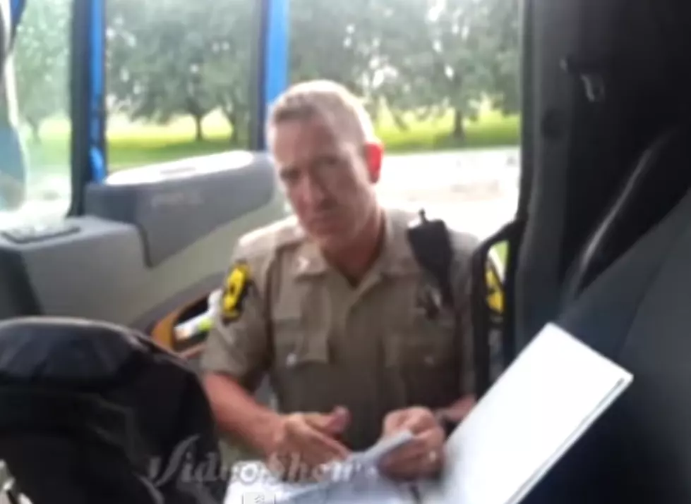 WATCH – Trucker Busts Cop for Speeding on Wet Roads While Talking on Cell Phone [VIDEO]