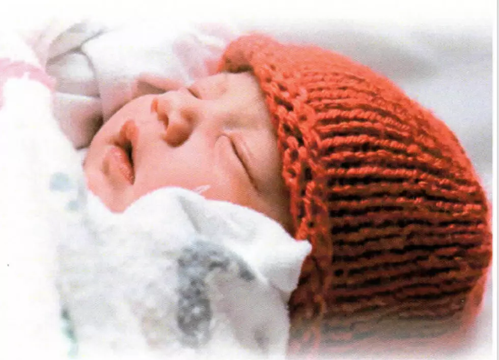 Newborns Receive Red Handmade Hats at St. Michael Hospital