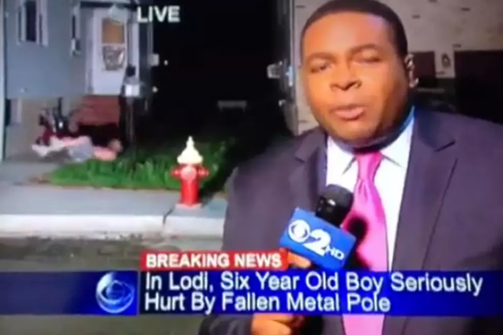 Half Naked Man Falls Out of Window Behind Live News Broadcast