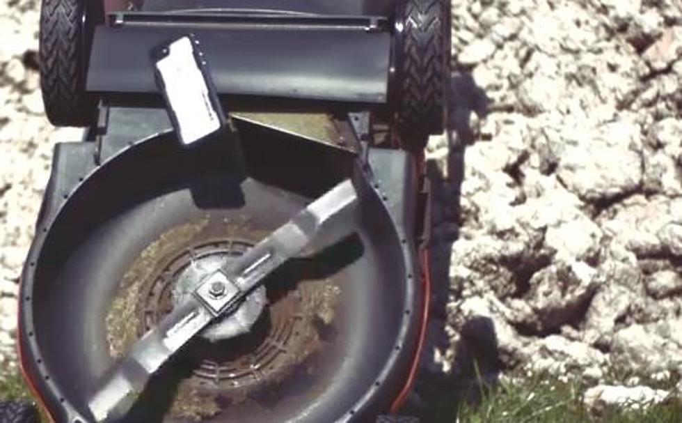 There’s Something Very Satisfying About Watching This iPhone Thrown Into A Lawn Mower [VIDEO]