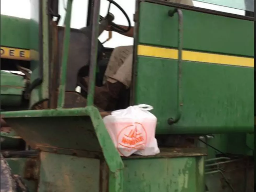 Texas Man Uses Tractor to Deliver Whataburger to Neighbors Trapped in Flood