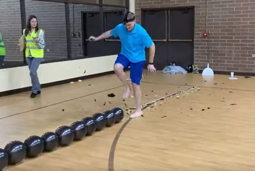 New World Record Set For Popping 100 Balloons With Feet [VIDEO]