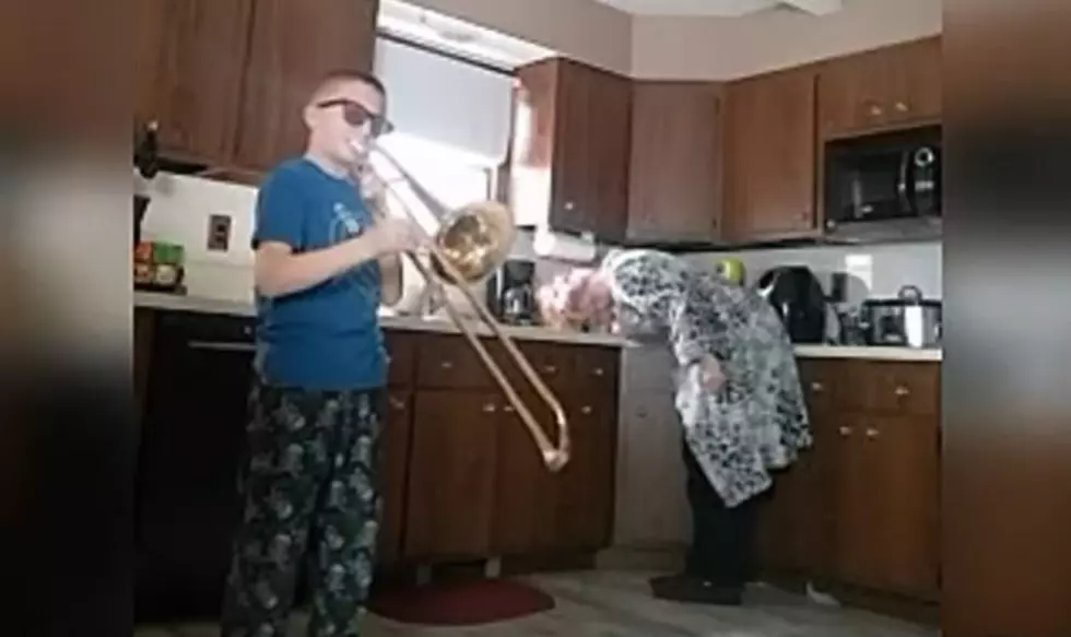 Mother and Son Practice Trombone Lesson Together [VIDEO]