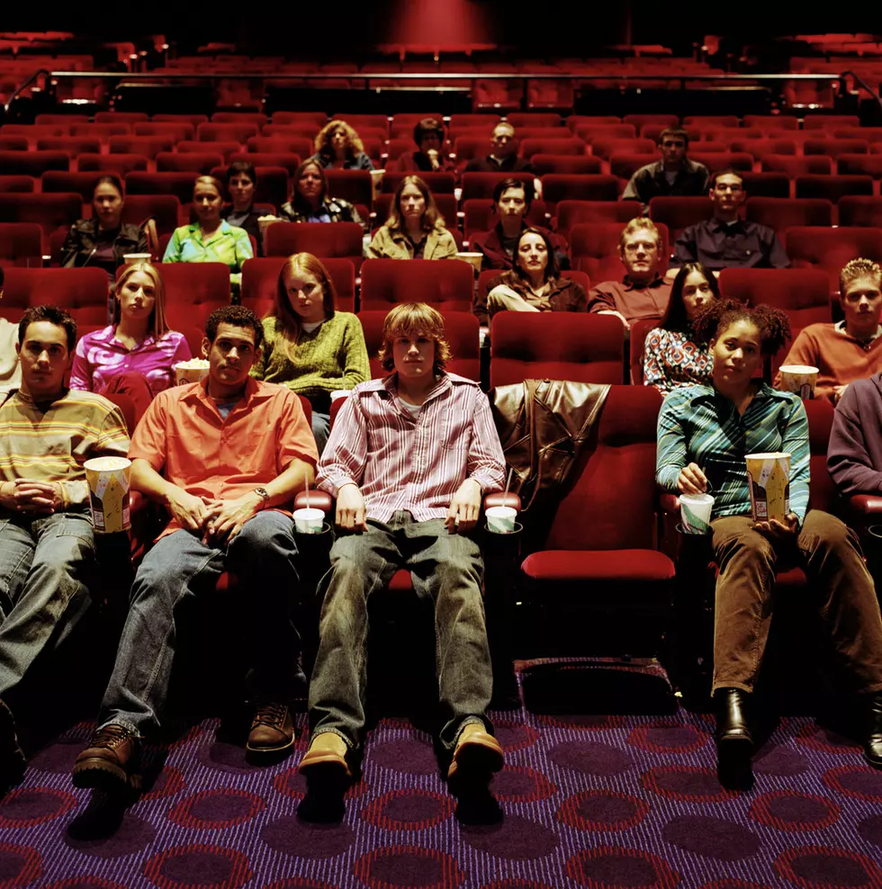 People sitting in movie theater