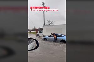 Truck Flies by Stuck Cars on Flooded Streets of Dallas, Texas