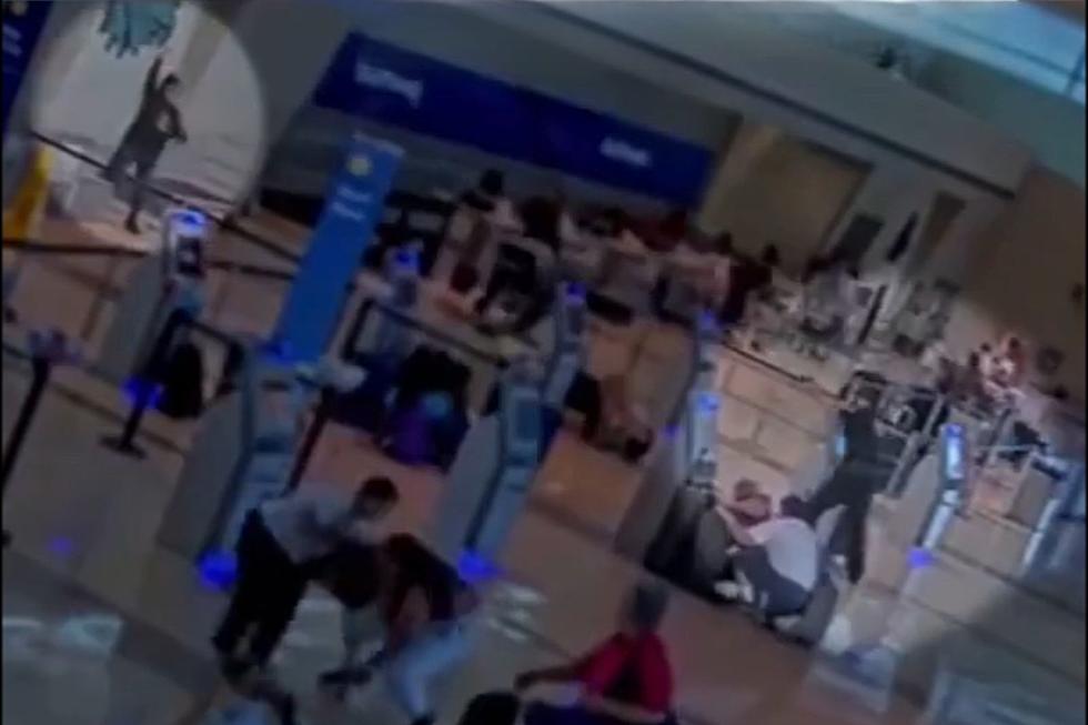 Video Shows Cop Shooting Woman Who Fired Gun at Dallas Airport