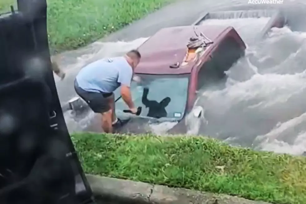 Watch Heroic Family Rescues Driver Trapped in Texas Flood