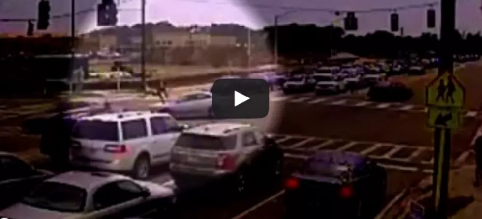 Motorcyclist Slams Into Car, Flips Through Air, Walks Away [AMAZING VIDEO]
