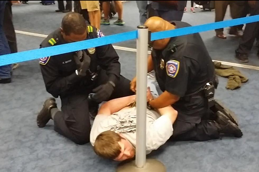 Crazy DFW Airport Fight Caught on Camera [NSFW]