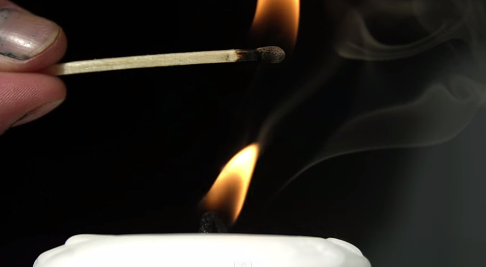 Watch a Guy Relight a Candle in Super Slow Motion
