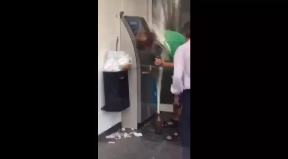 Drunk Dude at ATM Gets Blasted by His Own Beer