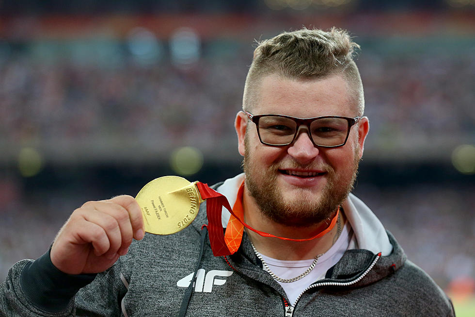 Drunk Champion Hammer Thrower Pays for Cab With His Gold Medal
