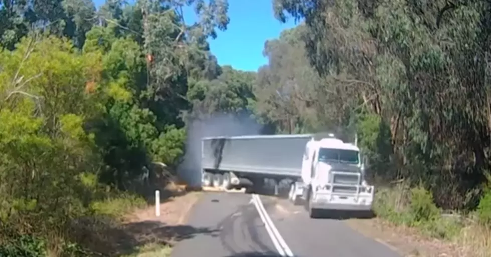 Out of Control Truck Runs Over Tree, Smashes Into Parked Car