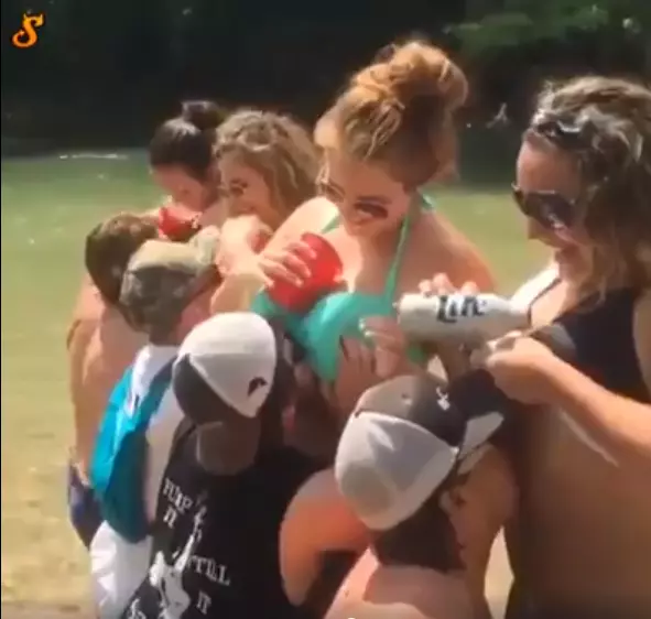 Random Texas Woman Flashes Boob During Family Photo