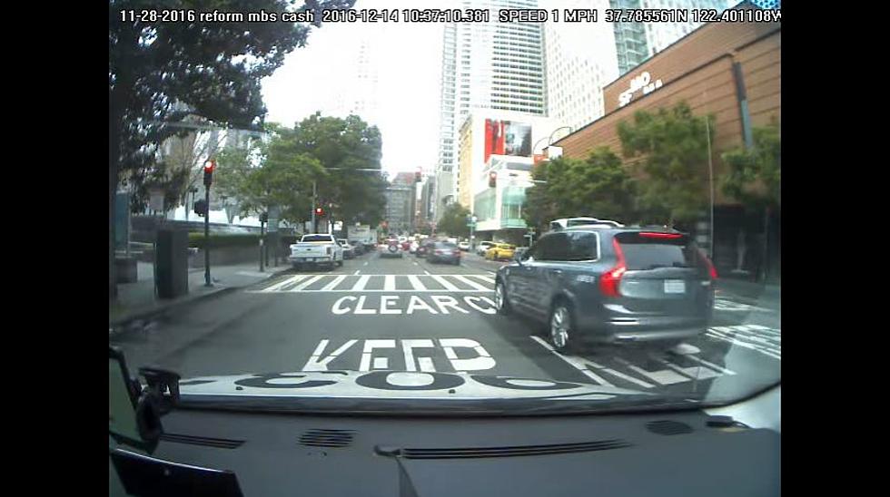 Watch a Self-Driving Uber Run a Red Light