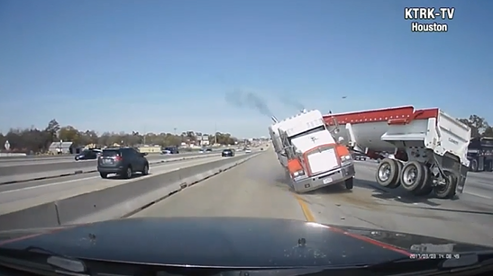 Houston Truck Completely Jackknifes on Busy Highway, Miraculously Hits No Cars [VIDEO]