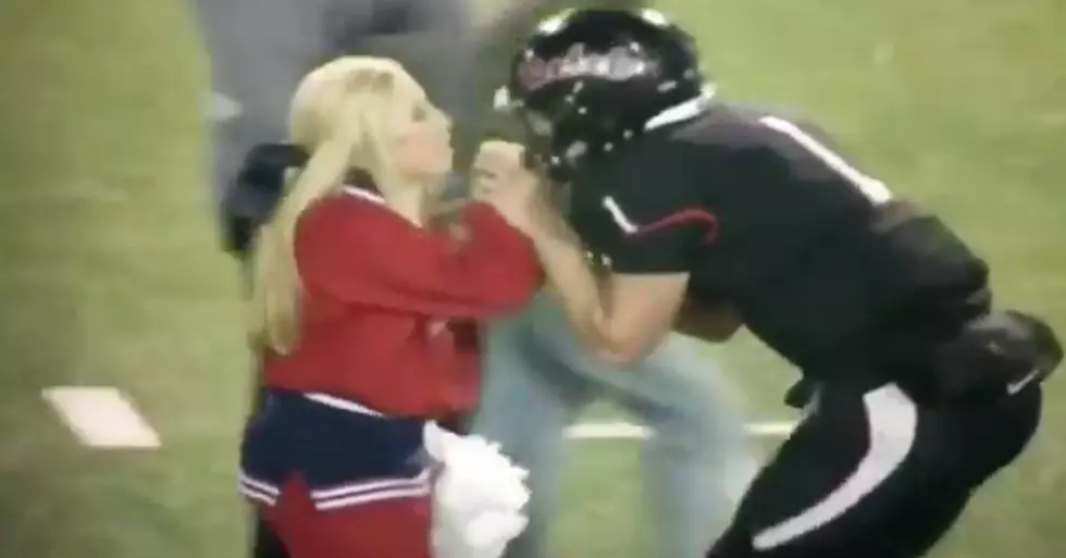 Cheerleader Drags Winning Boyfriend QB By Facemask