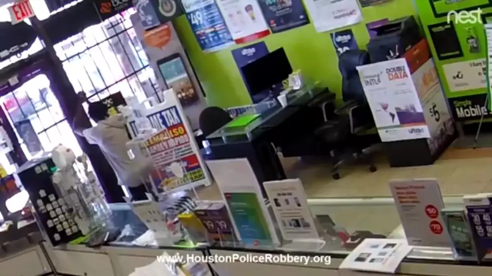 Watch an Armed Robber in Houston Get Locked in a Store and Beg to be Let Out