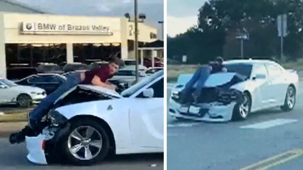 Texas Man Clings To Hood of Car After Getting Rear Ended [VIDEO]
