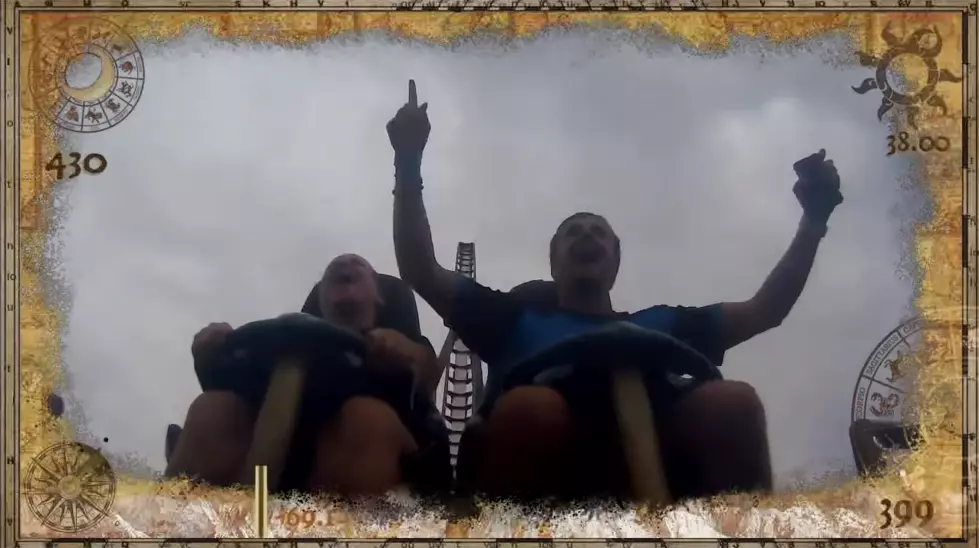A Man on a Roller Coaster Caught Another Rider’s Cell Phone