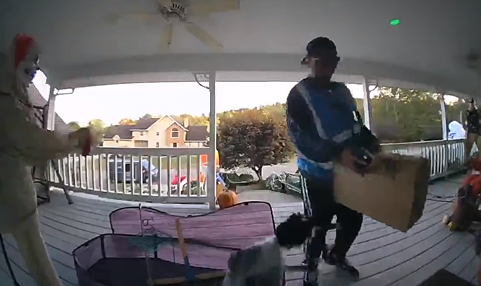 Watch This Delivery Guy Run From a Halloween Display