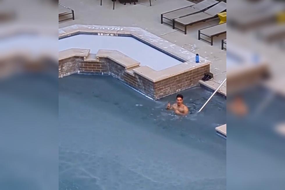 Watch: Texas Man Takes a Dip in a Frozen Pool