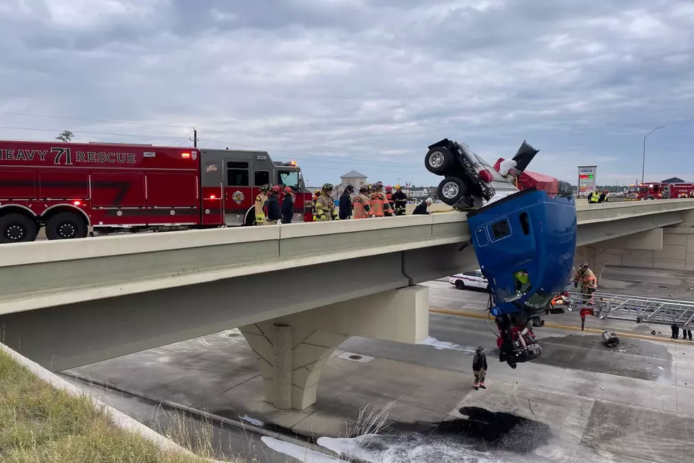 18-Wheeler Hanging Off of Bridge After Crash In Houston