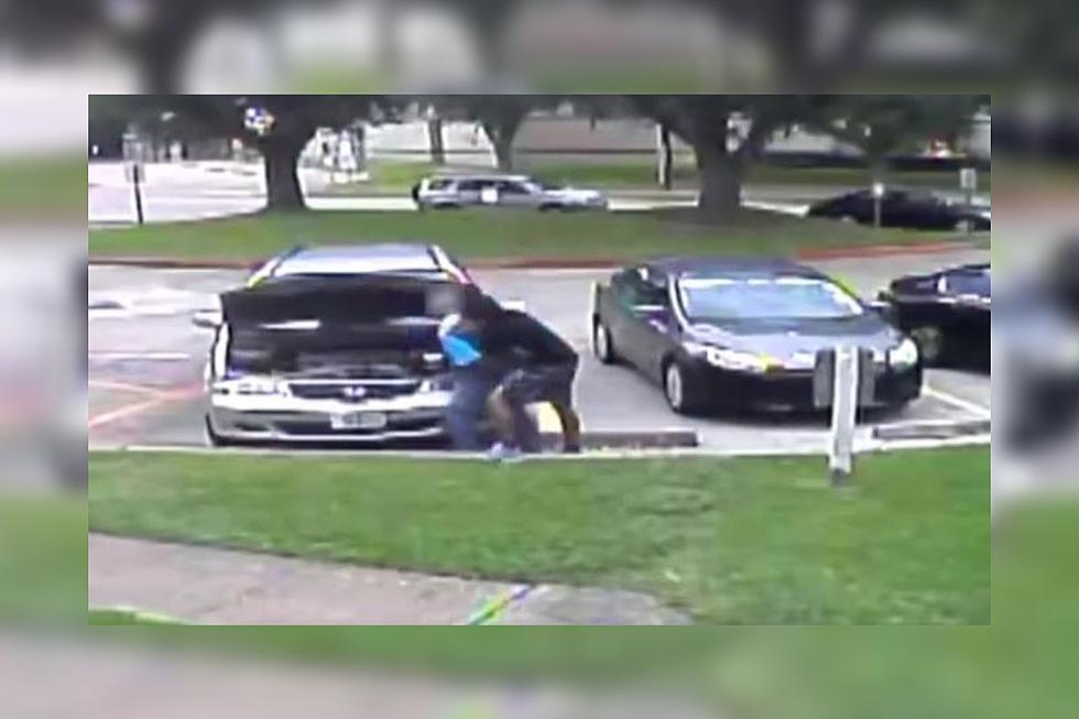 Video Shows Elderly Houston Man Robbed While Working on Car