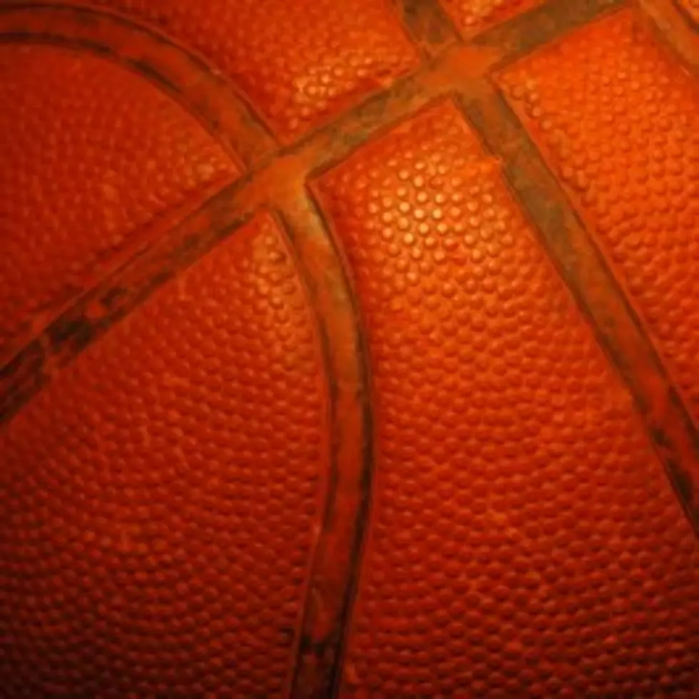 Inattentive Fan Focused on Phone Gets Drilled by Basketball