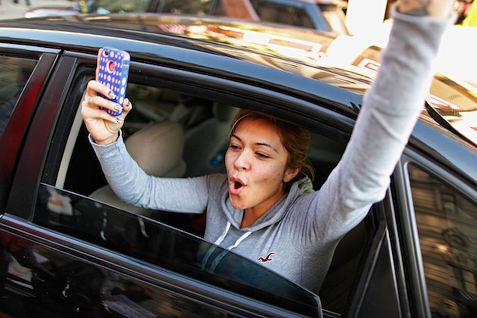 Topless Woman Causes Traffic Jam