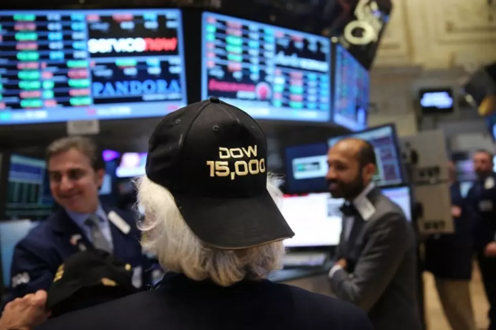 Dow Jones Closes Above 15,000
